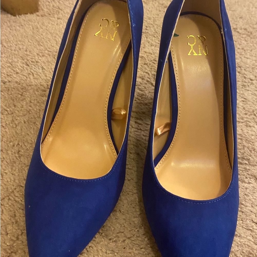 Striking Blue Suede Heels with Classic Design